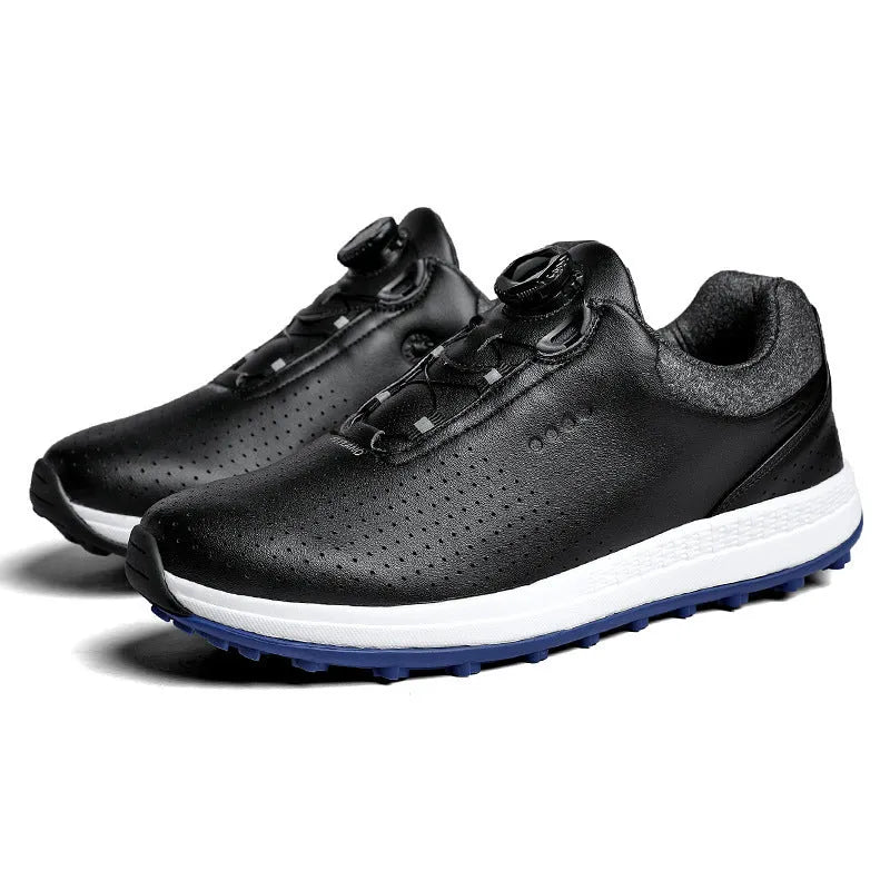 Men's white low top golf sneakers with breathable holes and a textured non-slip sole.