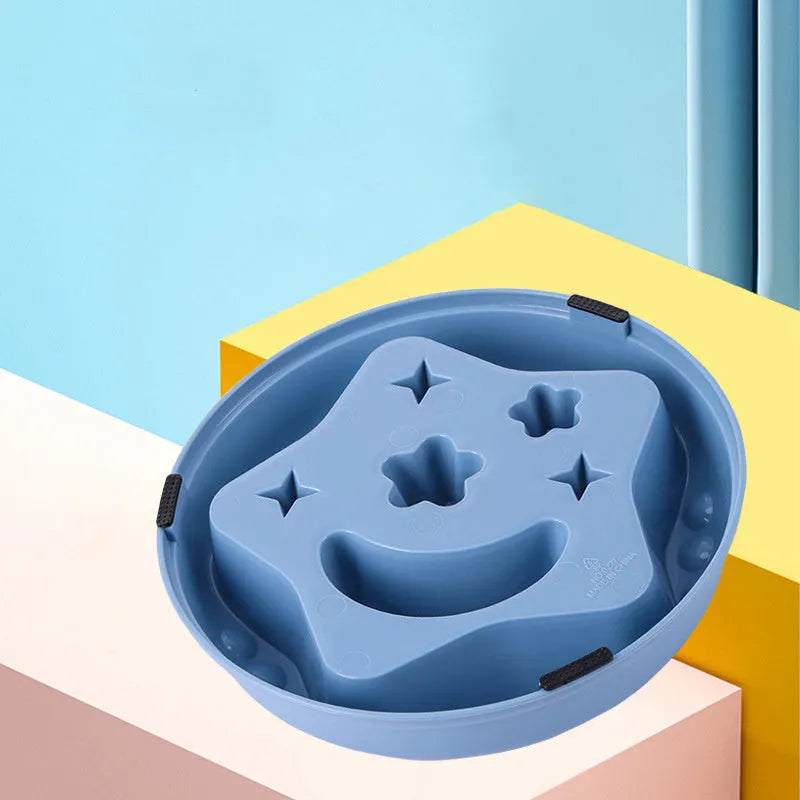 Moon star wings design slow feeder dog bowl in blue with non-slip base and internal ridges.