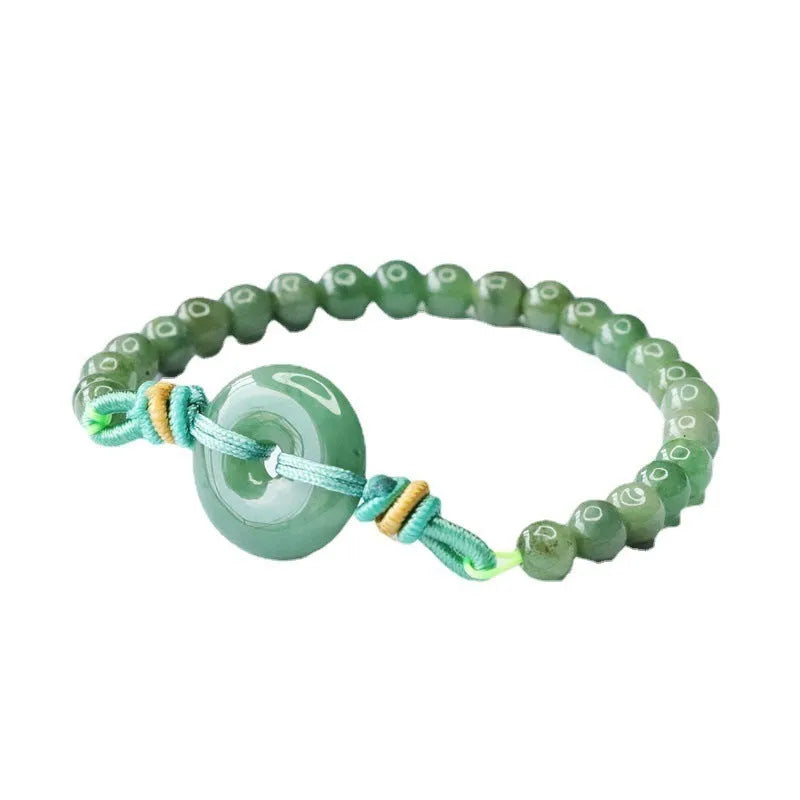 Emerald green jade bracelet with Chinese safety buckle and star-shaped 6mm beads.