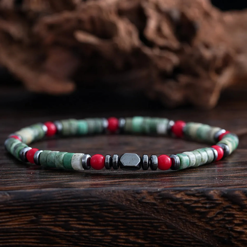 Bohemian style men's bracelet with cylindrical semi-precious stone beads on a hand-woven string.