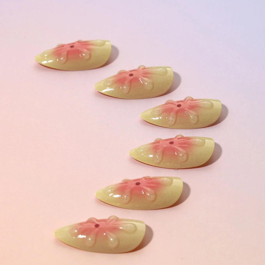 Cartoon 3D flower design on plastic detachable fake nails with jelly glue and file.