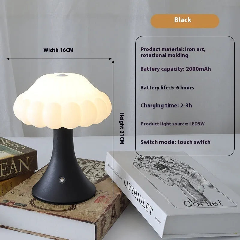 Small touch-controlled mushroom night lamp in wood grain colour on a table.
