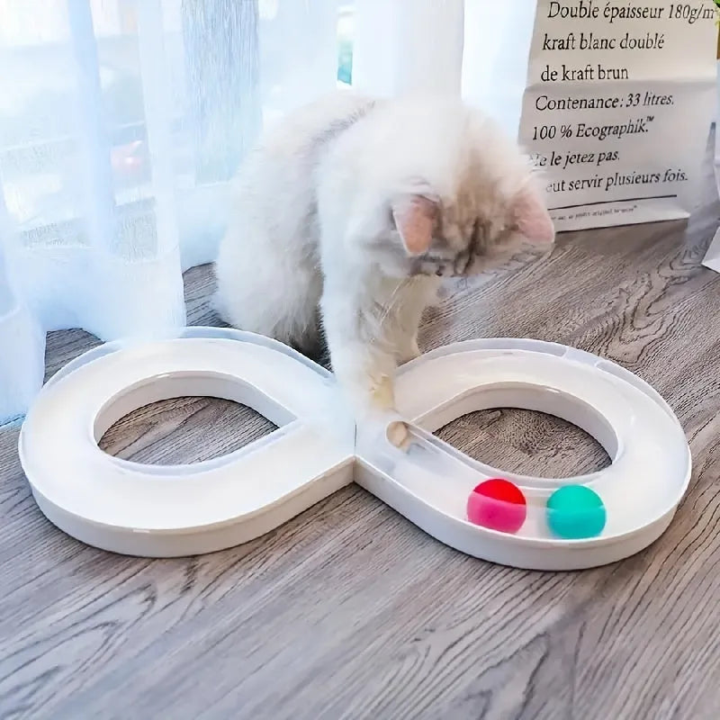 Multipack of four cat toys including a blue turntable track, a ball, and a teasing stick.
