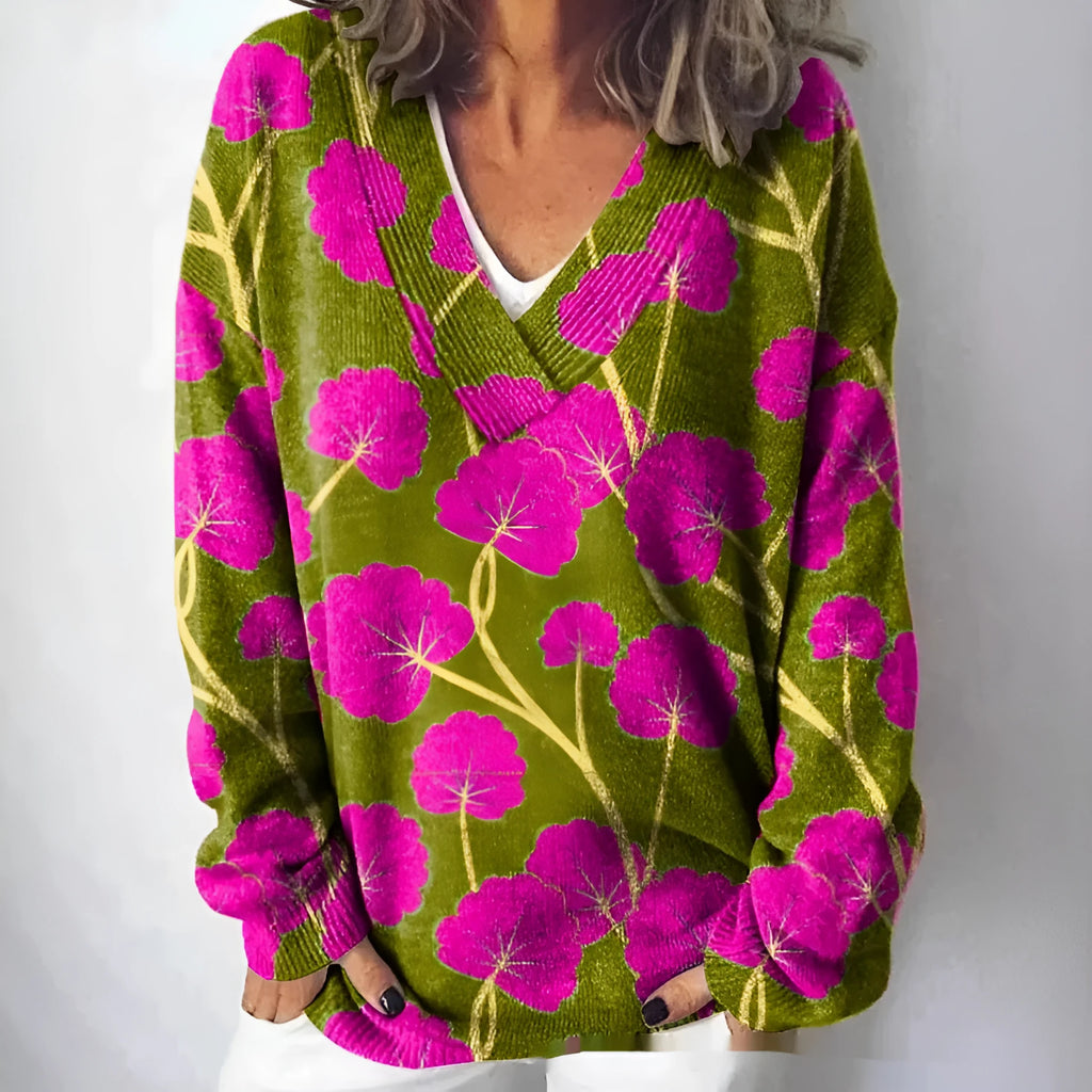 Women's V-neck long sleeve sweatshirt with a textured 3D floral print pattern in a retro style.