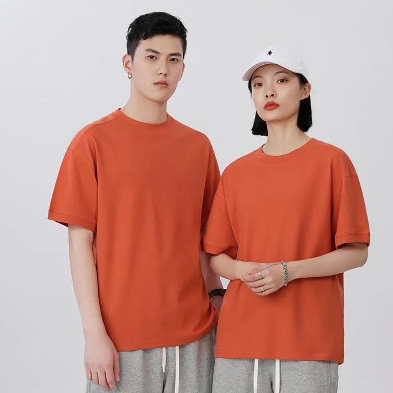 Breathable loose fit cotton short-sleeved t-shirt in a solid colour on a hanger.