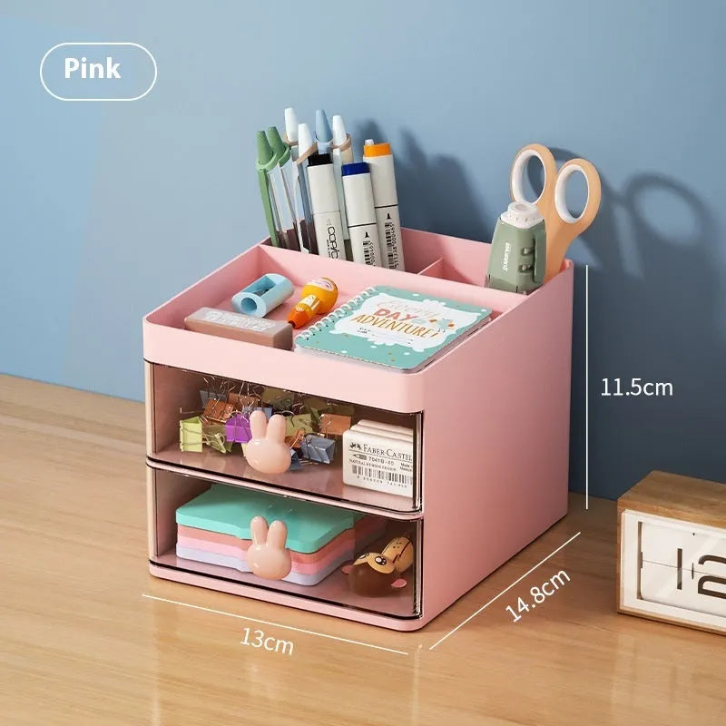 Transparent plastic desktop storage box with internal grid partitions, shown in pink colour.