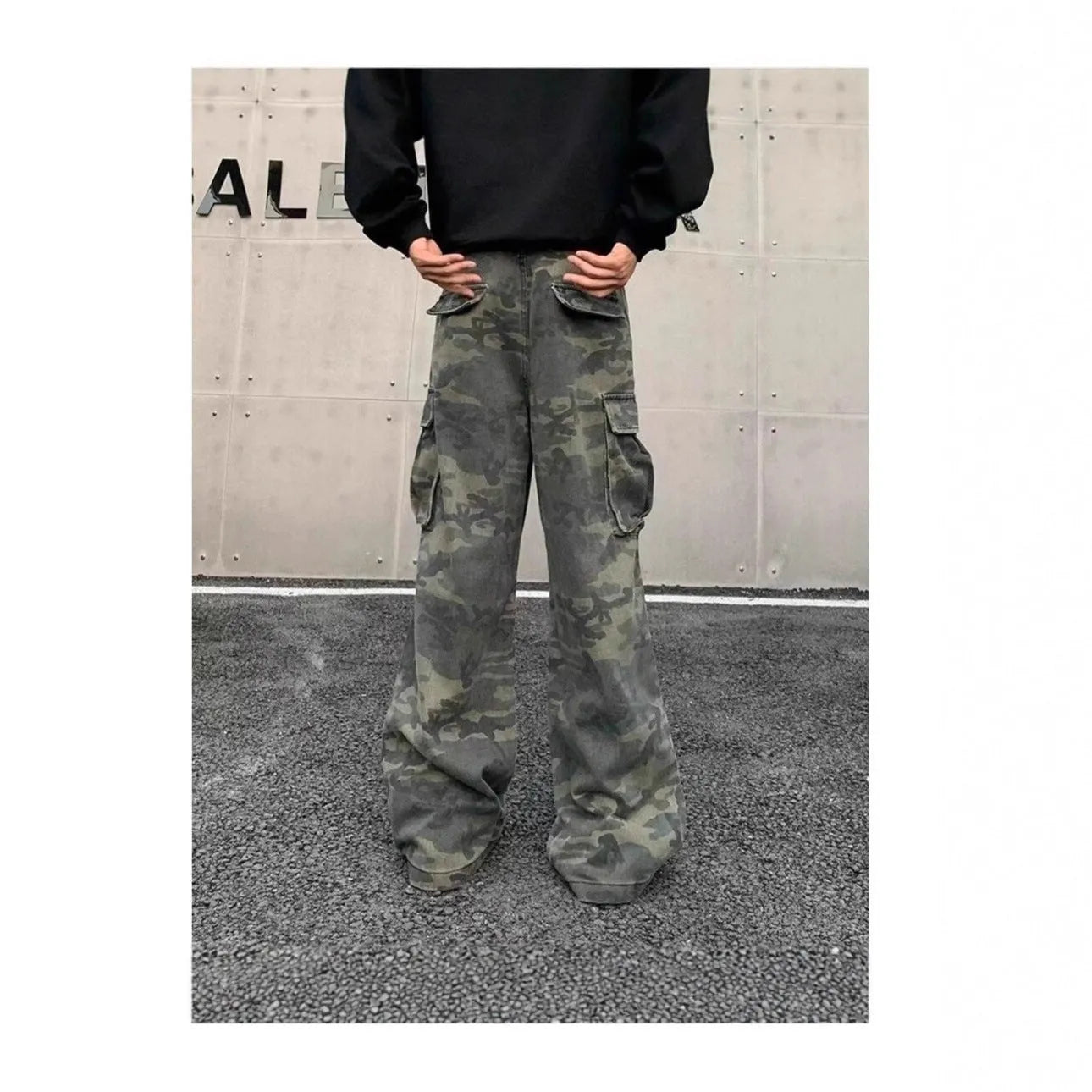 Men's olive and brown washed camouflage cargo trousers with multiple pockets on the thighs and sides.