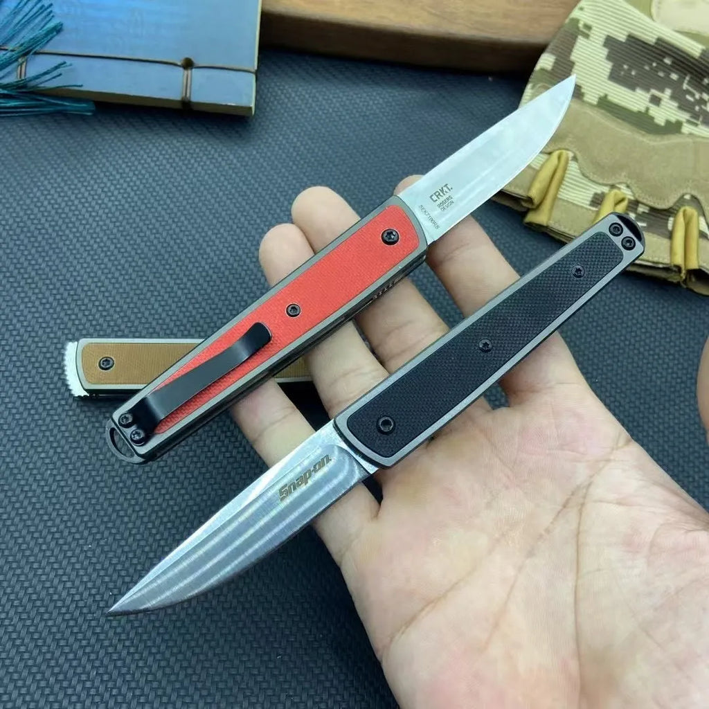 CRKT 7190 folding fruit knife with stainless steel blade in black, red, or coffee colour, showing closed and open positions