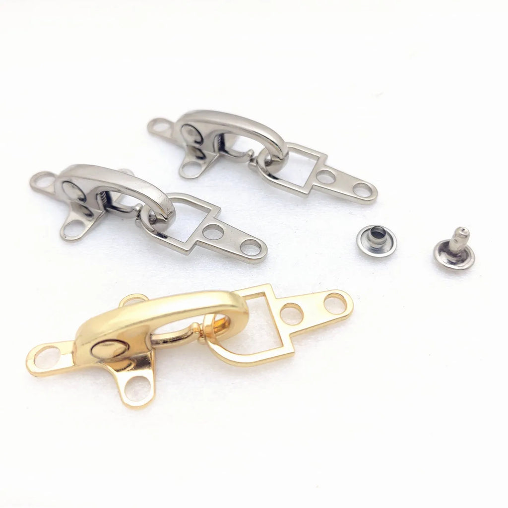 Alloy metal aircraft buckle decoration measuring 5.85cm in bronze, gold, gun colour or silver finish