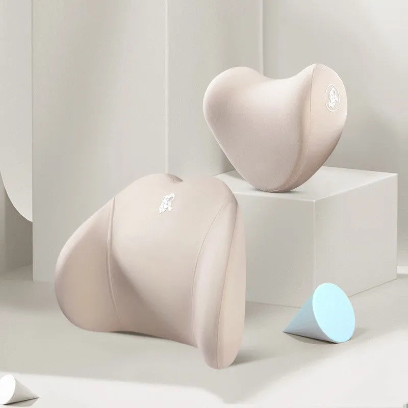 Heart-shaped car pillow set with headrest and lumbar support pillow in soft cotton, shown in assorted colours
