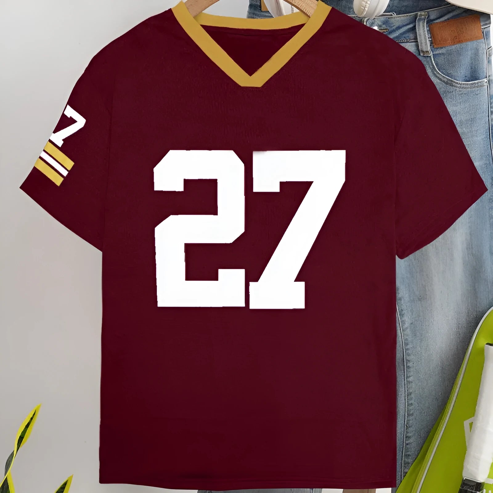 Red loose fit cotton T-shirt with white digitally printed letter pattern on the front.