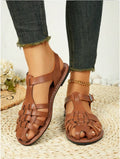 Dark brown women's vintage weave sandals with closed toe, roman buckle, and a soft rubber sole.