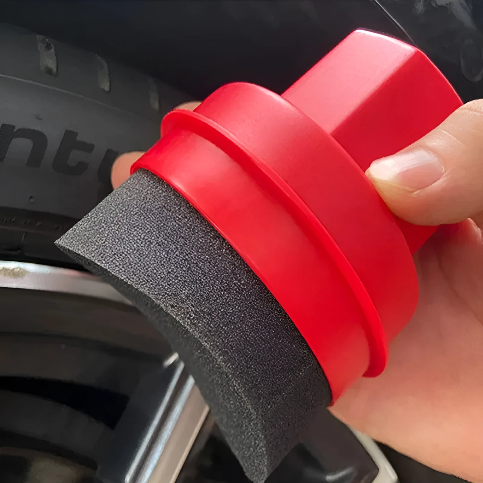 Hand-held black car tyre polishing sponge brush with a lid, showing high-density foam and PP plastic handle.