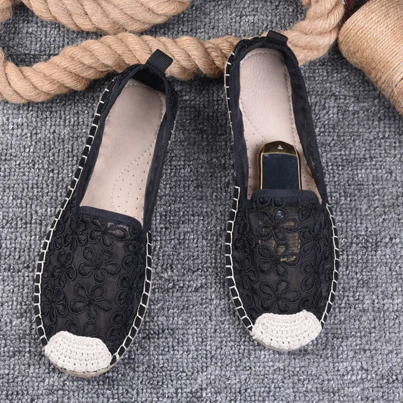 Women's flat-heel linen fisherman shoes in pansy white with sewing thread detail and round toe.