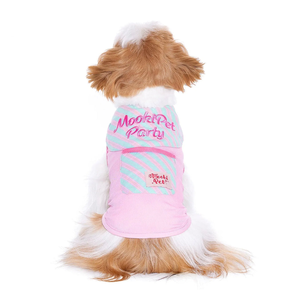 Pink pet cloak scarf vest set on a pet