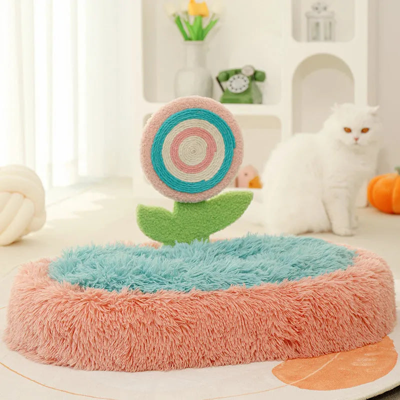 Pink elliptical lollipop-shaped plush cat bed with a removable cover.