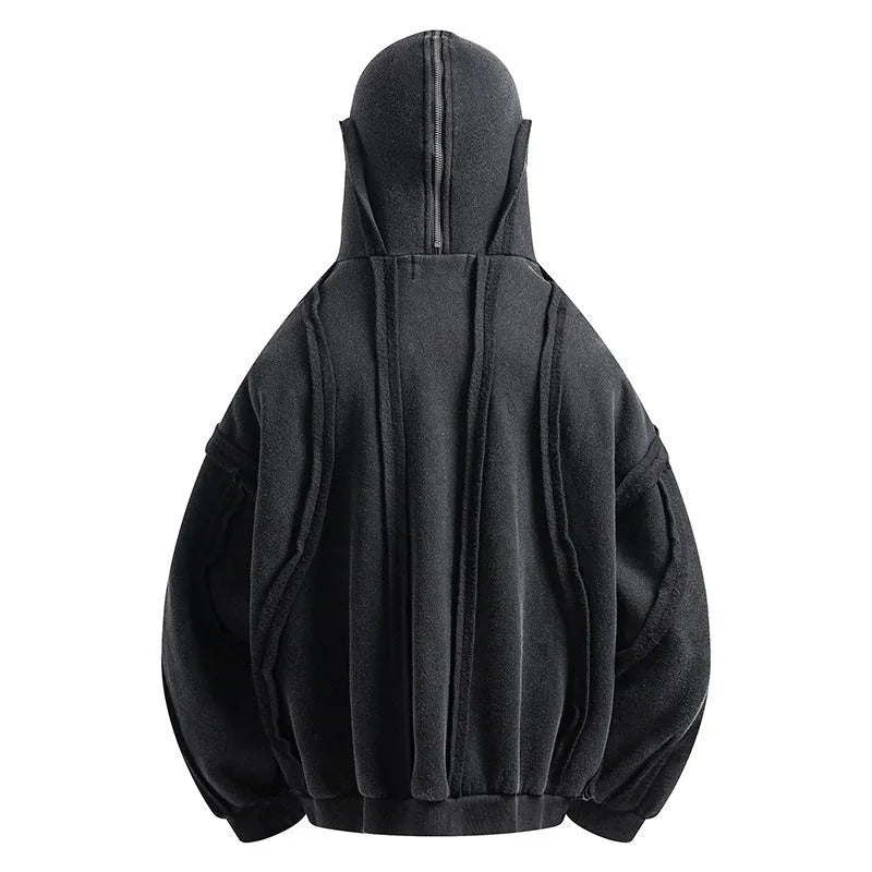 Black men's retro-style padded hooded jacket with an abstract pattern, shown on a model.