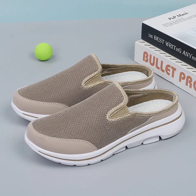 Breathable mesh toe holder slippers in solid colours on a flat heel sole.