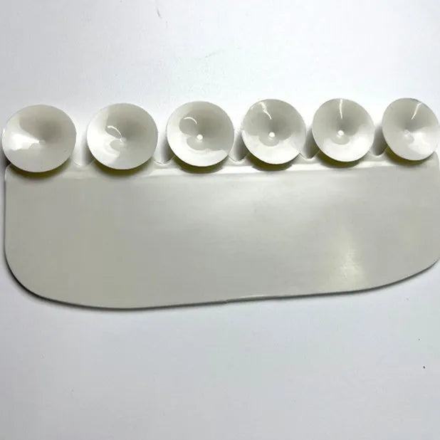 White PVC urine blocking board placed on toilet seat for children's splash prevention