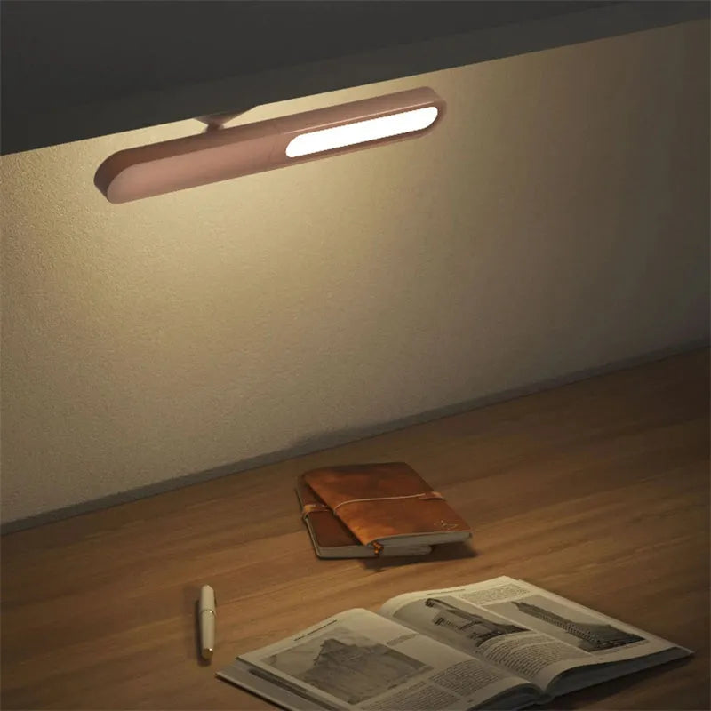 Geometric design desk lamp with magnetic base for wall mounting in white or khaki colour
