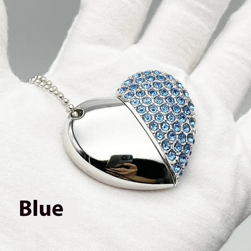 Brick-inlaid heart-shaped metal USB flash drive showing colour options and compact size