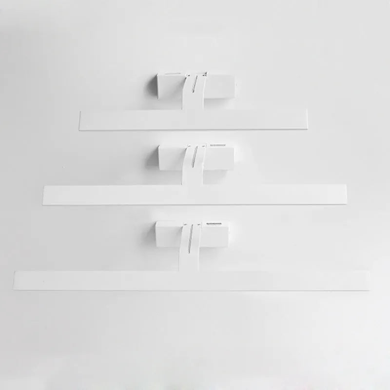 White LED bathroom mirror headlight with tri-colour dimming, shown in 580mm length above a mirror.