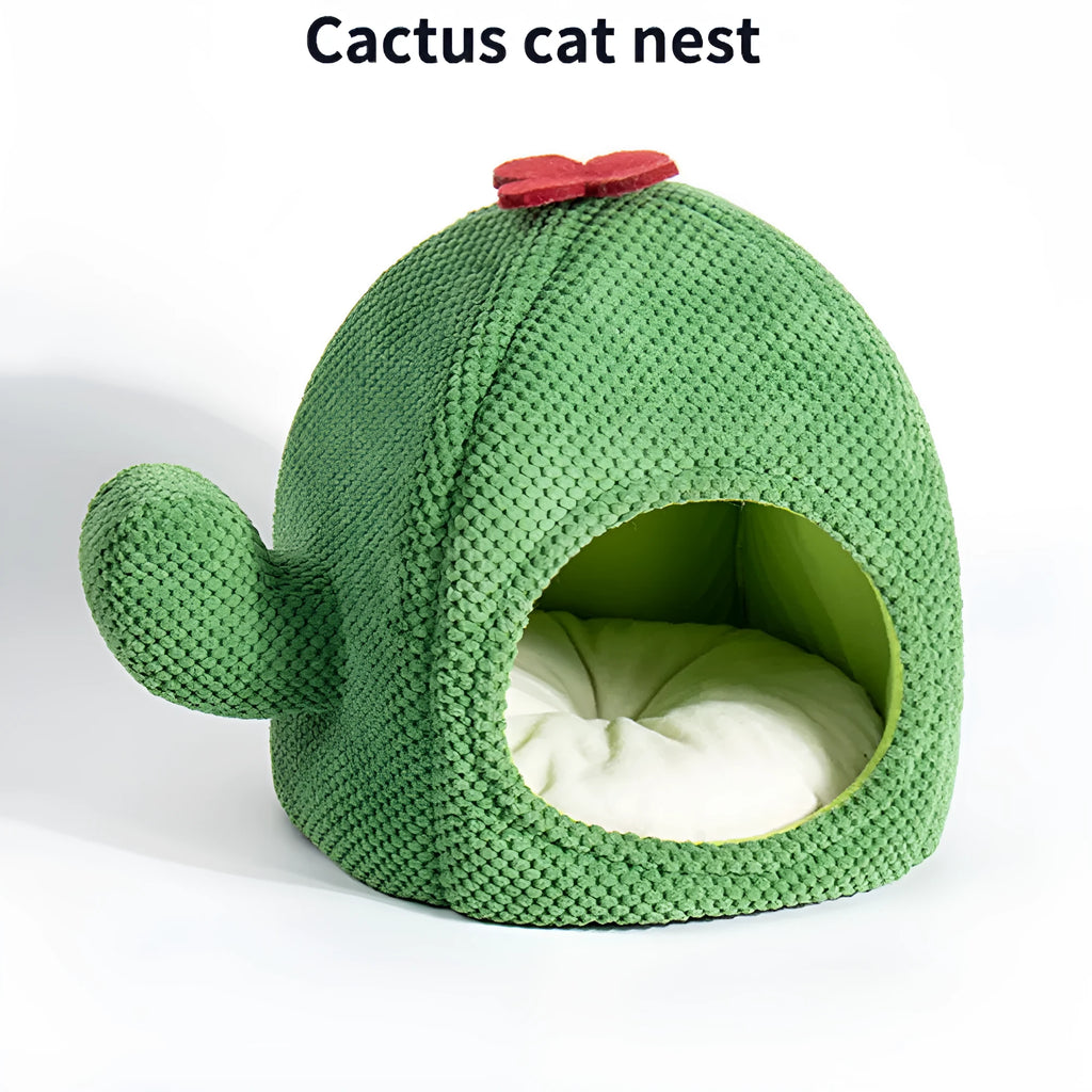 Green cactus-shaped enclosed cat bed tent with a plush cushion inside for kittens or small dogs.
