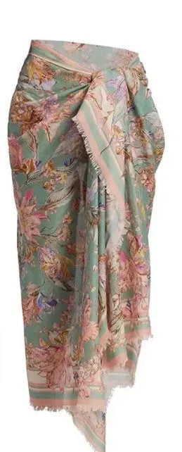 Women's creamy-white floral bikini suit with skirt for beach vacations