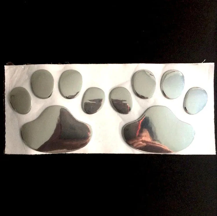 PVC car sticker with hand-shaped brush design showing dog footprints pattern measuring 7 cm length