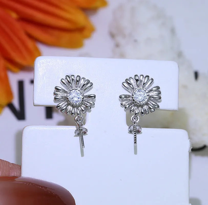 Baroque style S925 sterling silver earrings with intricate openwork floral frame and butterfly clasp.
