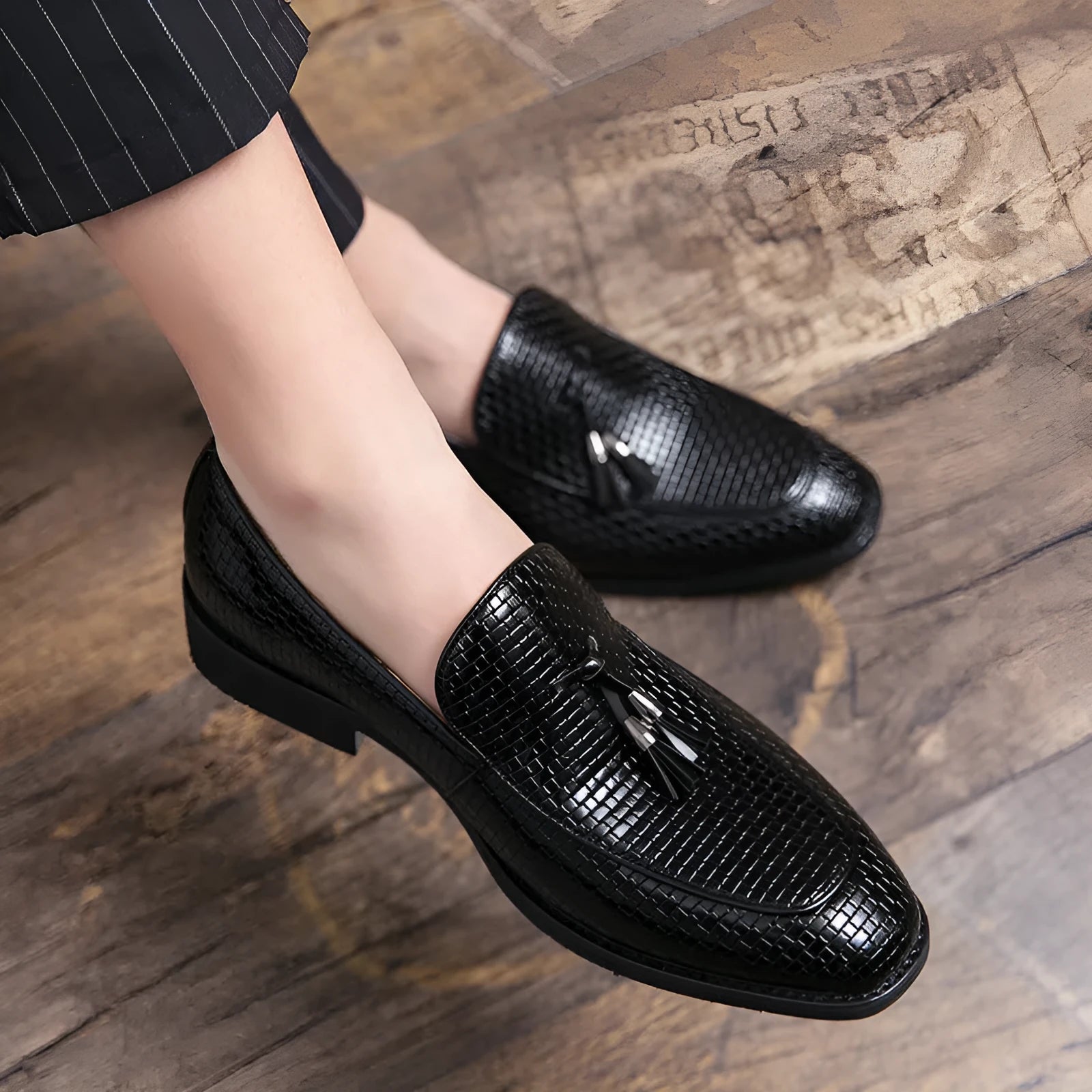 Men's black pointed slip on shoes with tassel detail and artificial PU upper