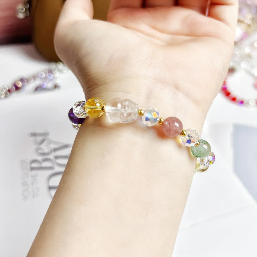 Handcrafted crystal bracelet featuring combined phoenix and nine-tail fox animal motifs
