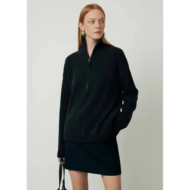 Wool bandage dress with loose lapel neckline and long sleeves in black.