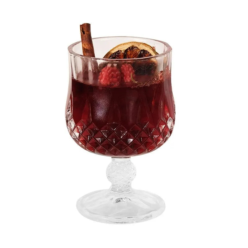 Glass wine goblet containing mulled wine scented candle with crystal jelly wax