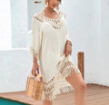 Apricot crocheted knitted patchwork beach dress with half sleeves on a hanger