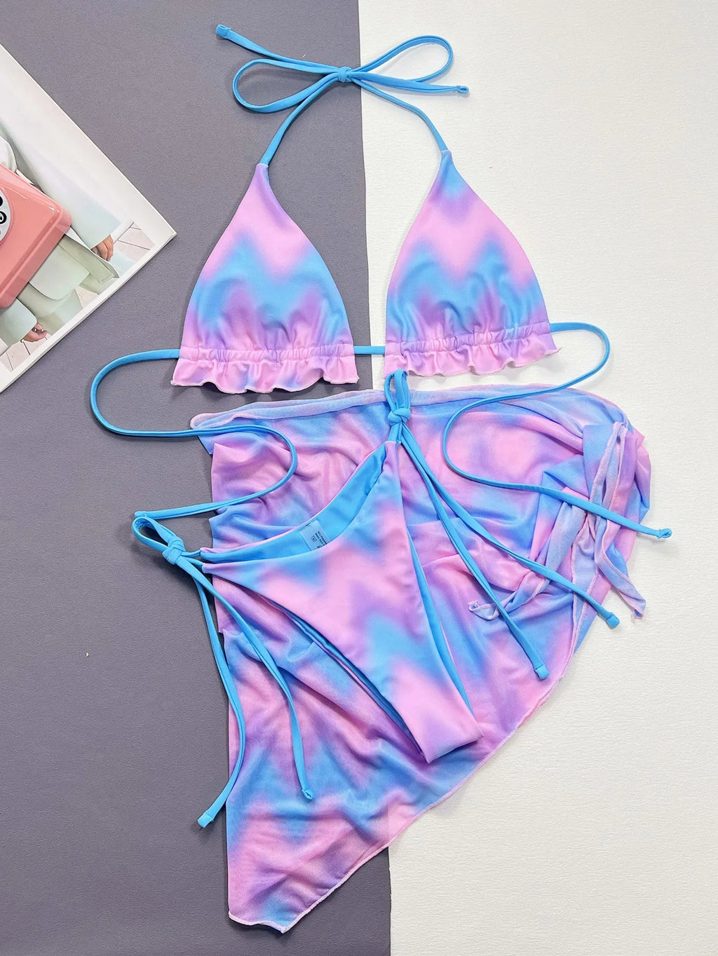 Women's split tie-dye swimsuit bikini set showing bra, skirt and panties