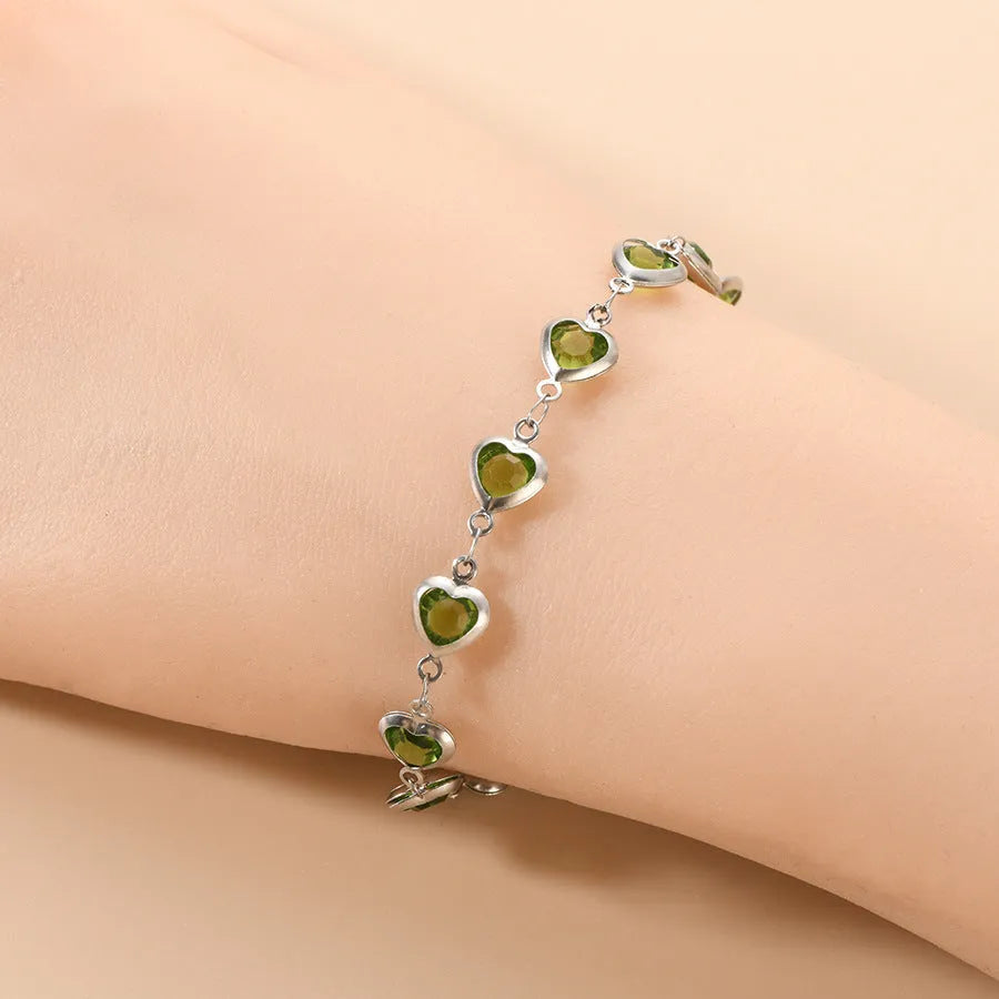 Geometric stainless steel bracelet with electroplated colourful finish showing round and oval design elements