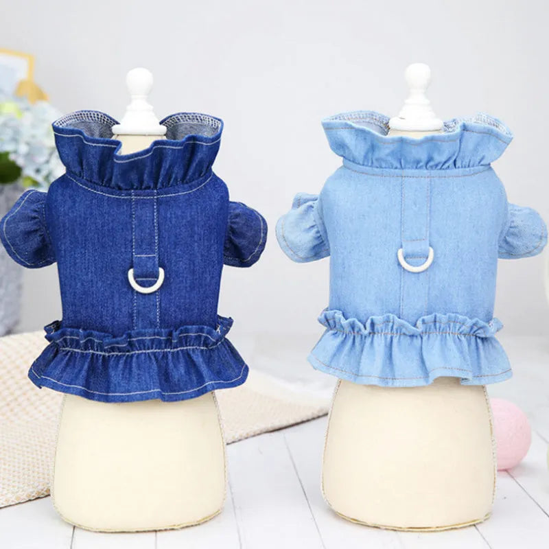 Blue denim dog dress with ruffles vest detail and a metal leash hook on the chest.