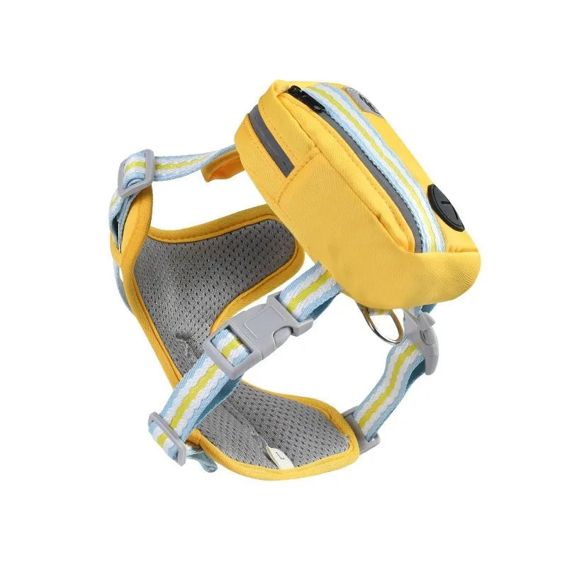 A dog wearing a green Oxford cloth anti-strangulation harness with a metal D-ring and adjustable belly straps.