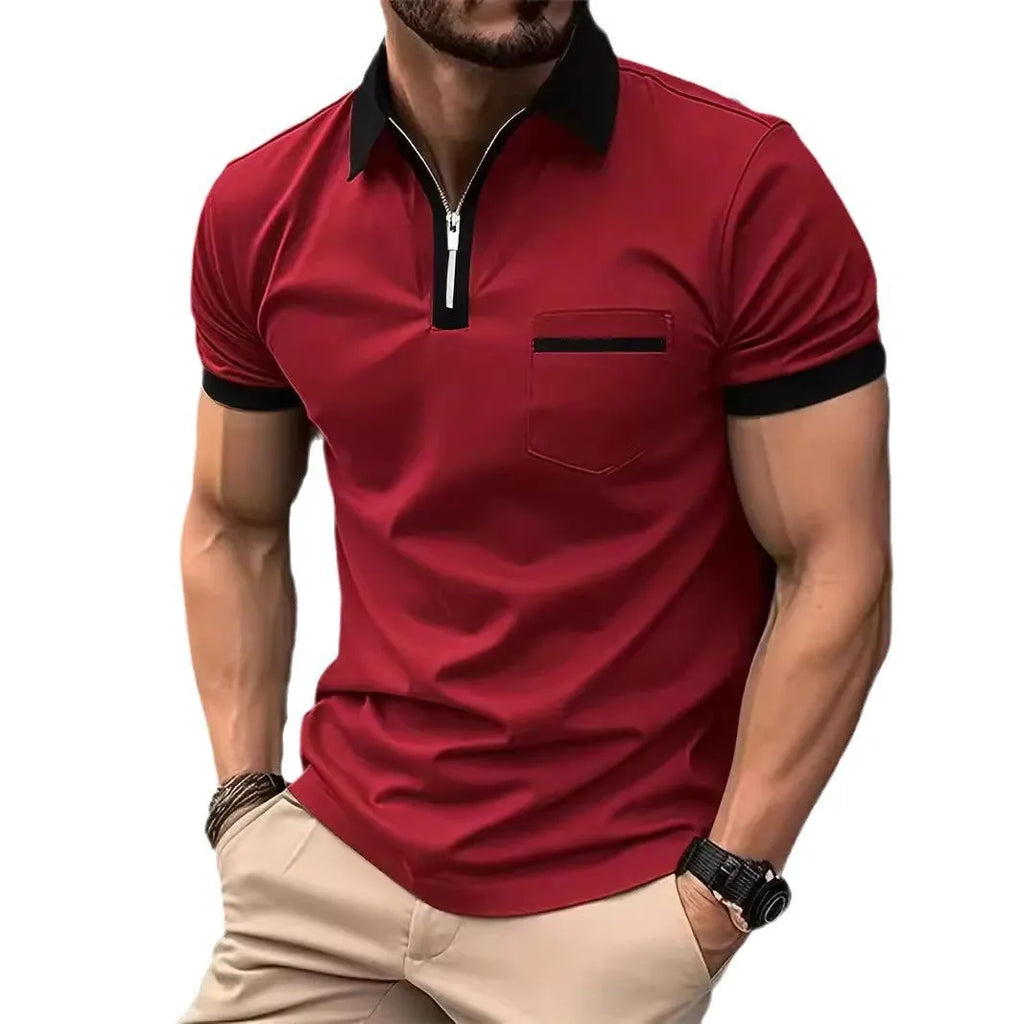 Man wearing a loose-fit men's short sleeve casual shirt with a chest pocket and zipper decoration.