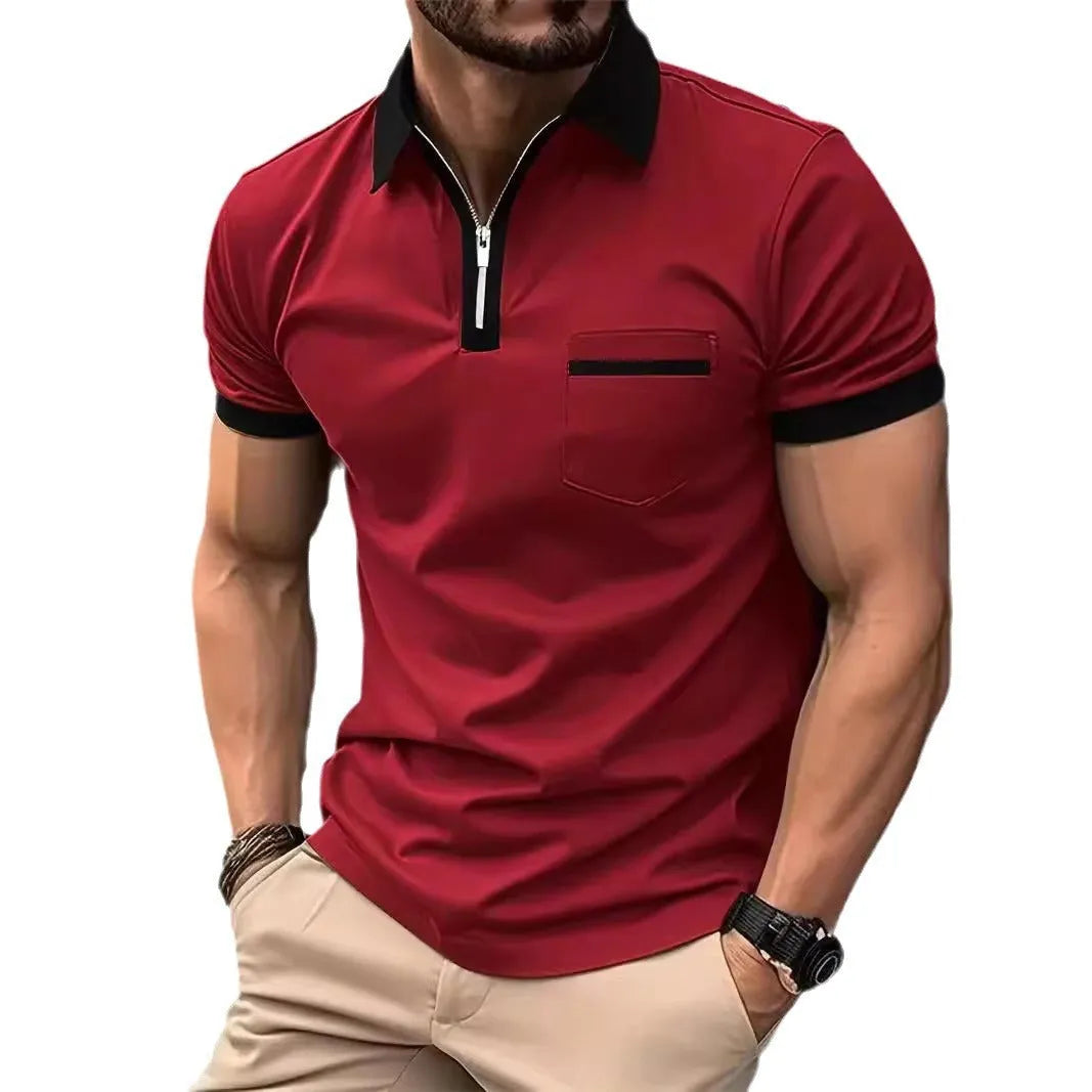 Man wearing a loose-fit men's short sleeve casual shirt with a chest pocket and zipper decoration.