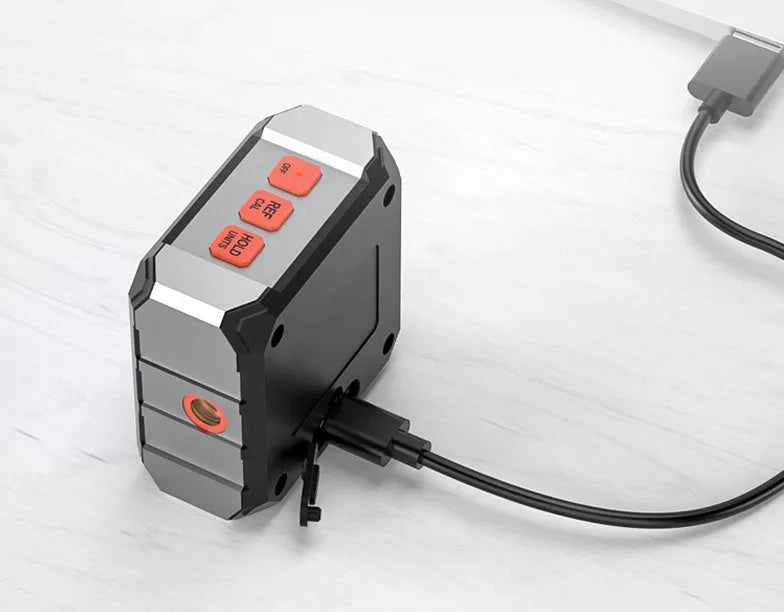 Longyun digital laser inclinometer with black alloy casing and backlit display on a metal beam.