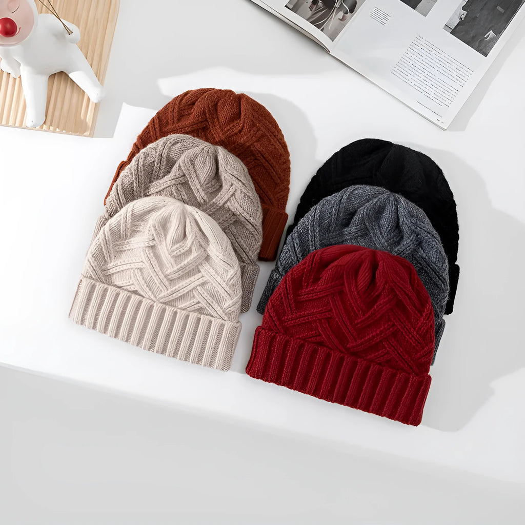Wool knitted dome hat for women in ankela red with totem detailing.