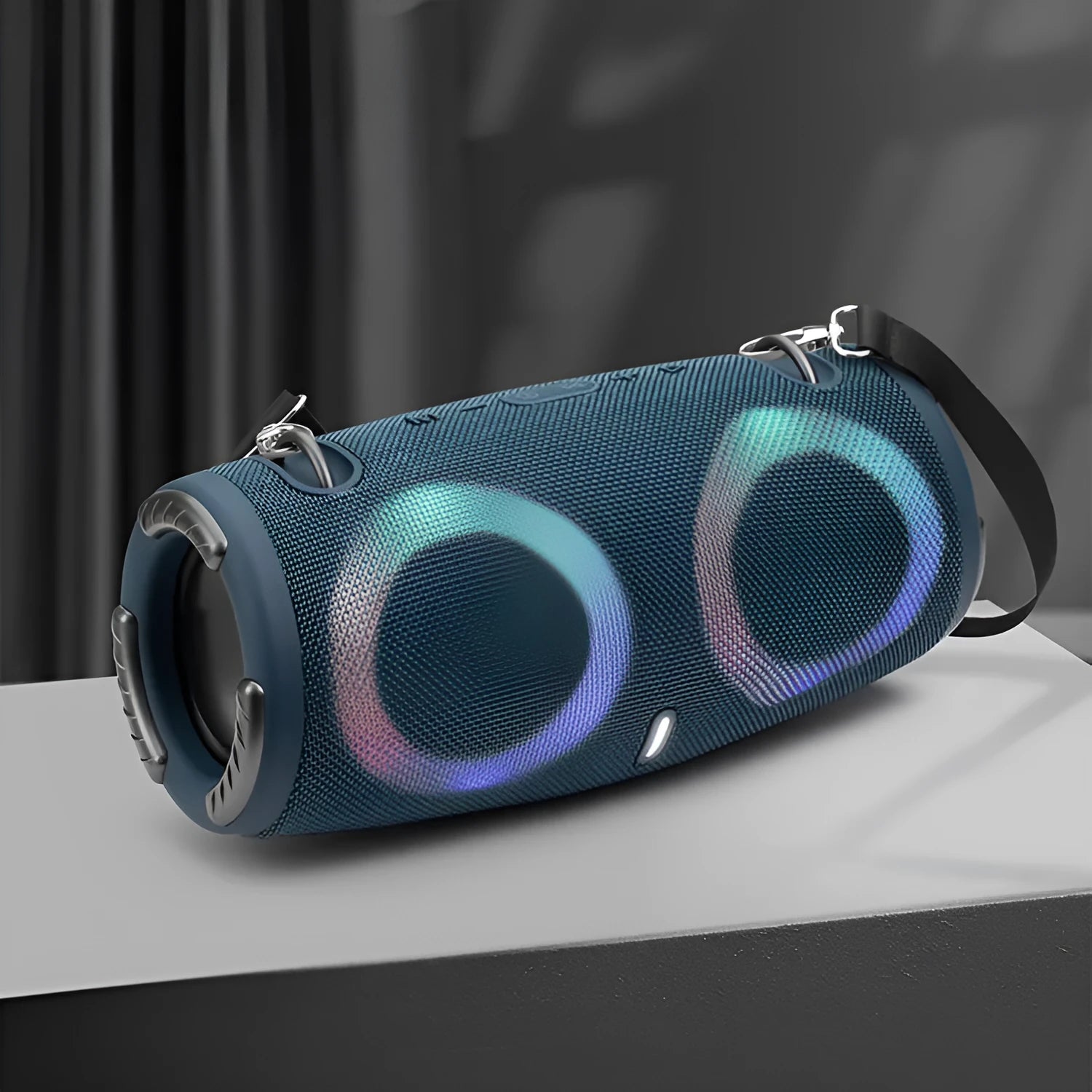 War Drum portable Bluetooth speaker with multi-colour RGB lights, showing carry strap and waterproof casing.