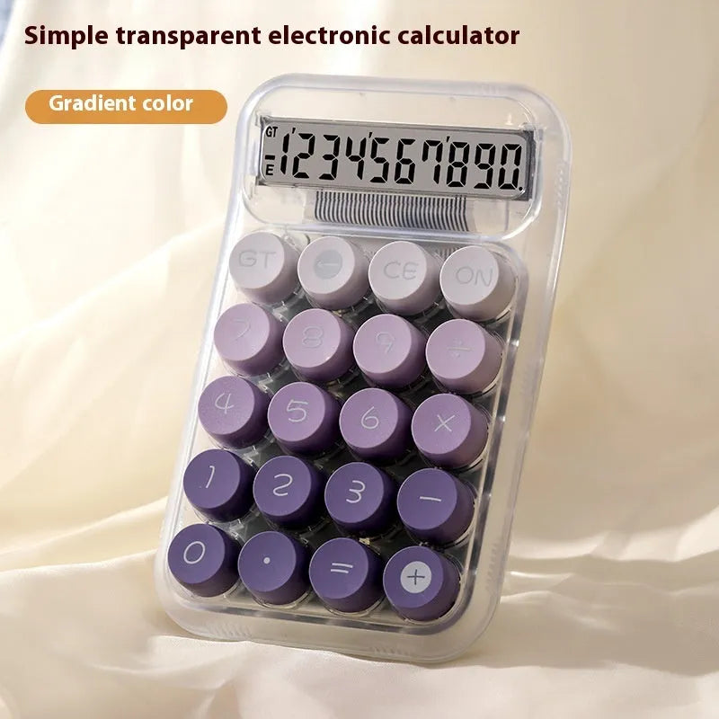 Keyboard-style gradient colour calculator in mute blue, green, pink, or purple on a desk.