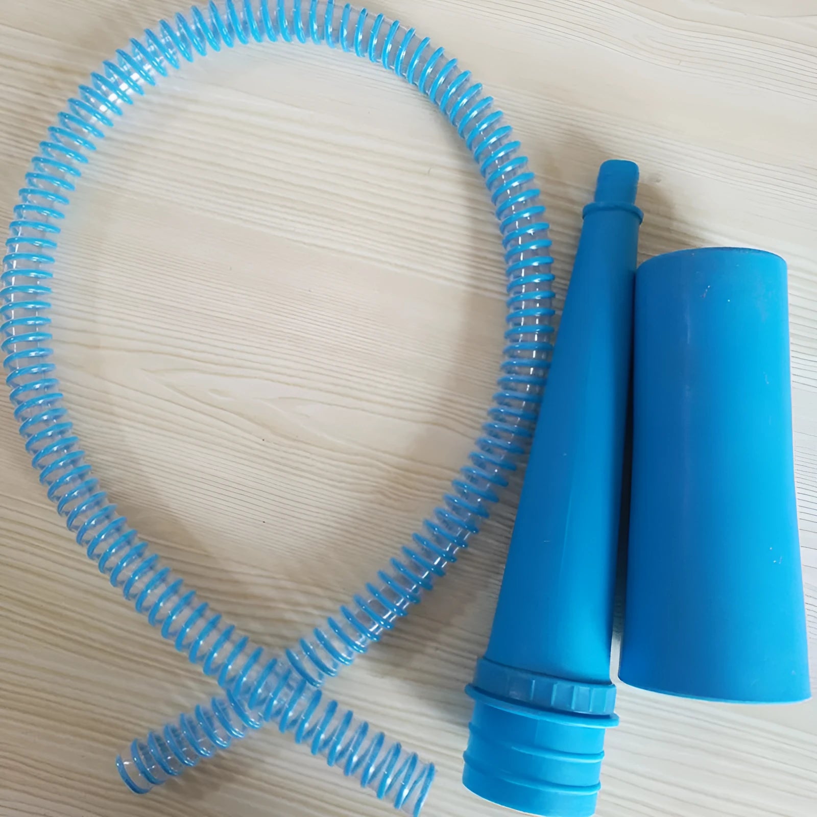Blue plastic suction pipe cleaner for appliances, showing its 114 cm length and round head.