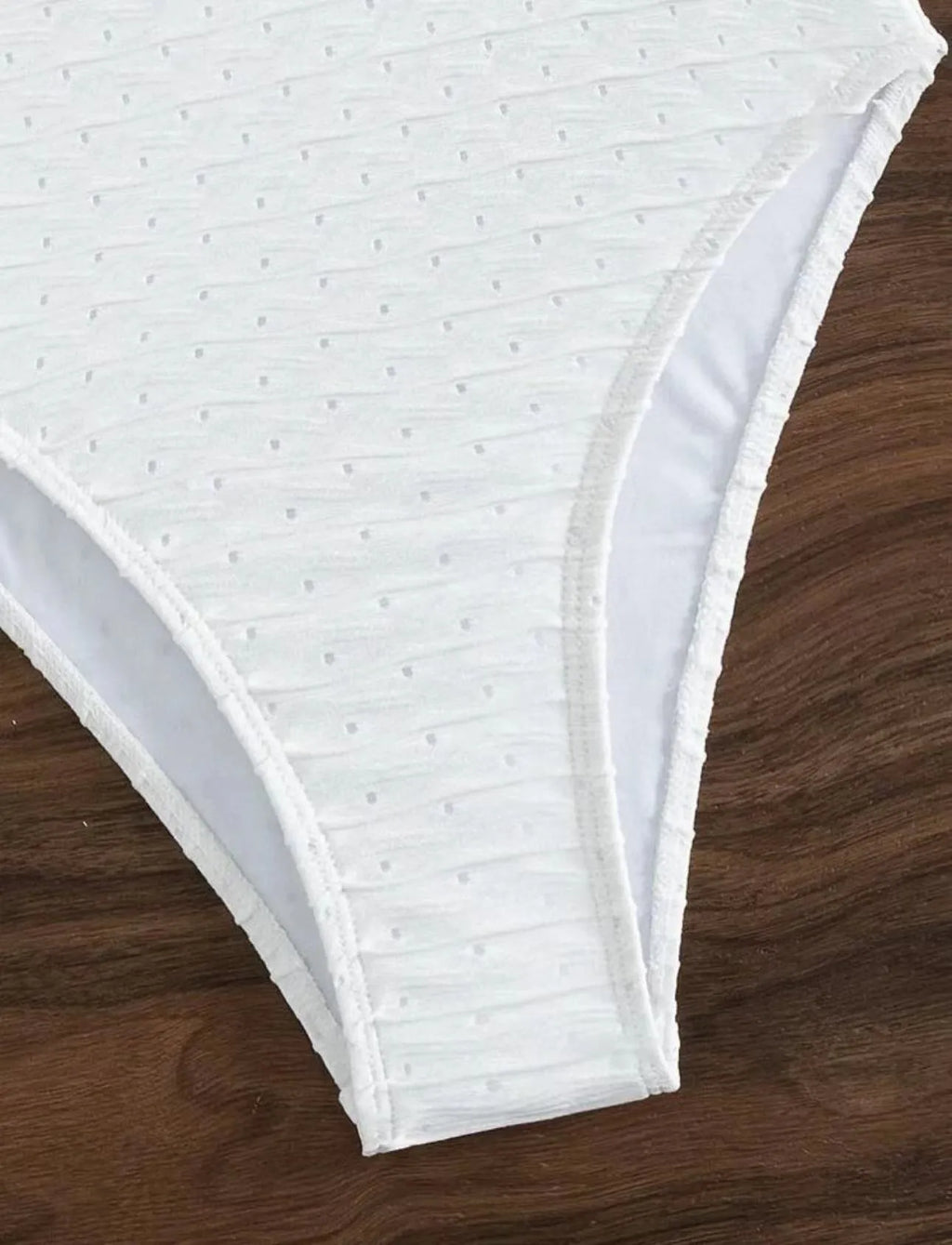 White women's one-piece swimsuit with sling design and briefs-style European pattern