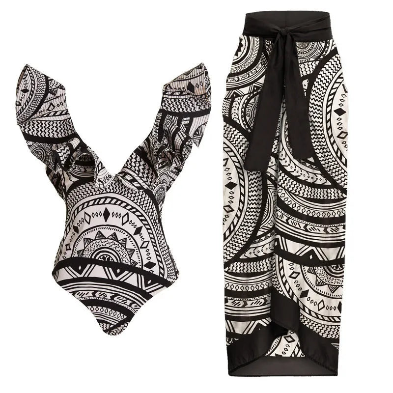 Women's vintage print one-piece swimsuit with deep V-neck and ruffled detailing in polyester fabric