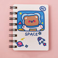 Compact astronaut-themed pocket flipper notebook showing Astronaut Bear cover design