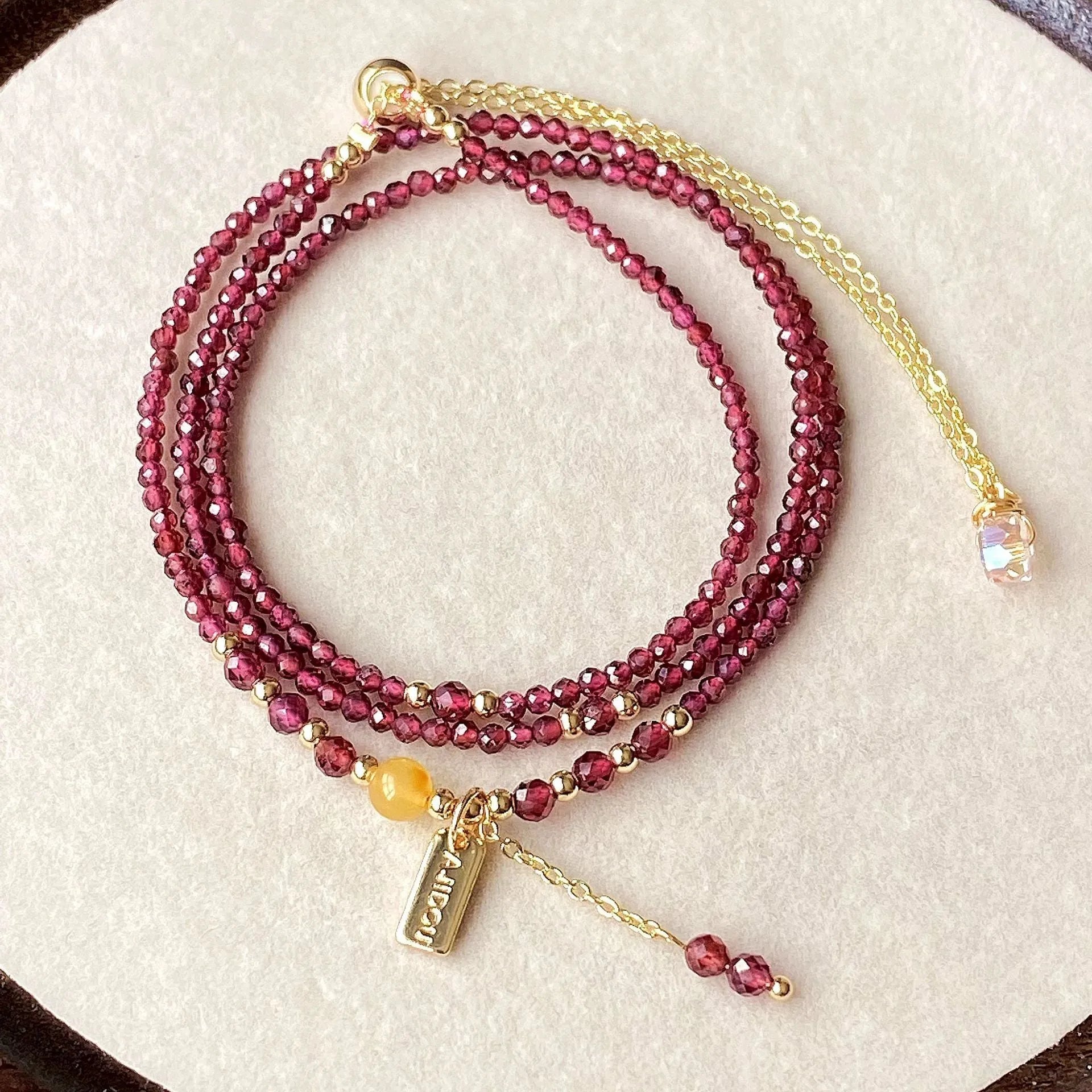 Wine red garnet bracelet necklace with three-circle design and beeswax cut surface texture